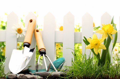 Gardener wearing PPE during maintenance work at Manor Park